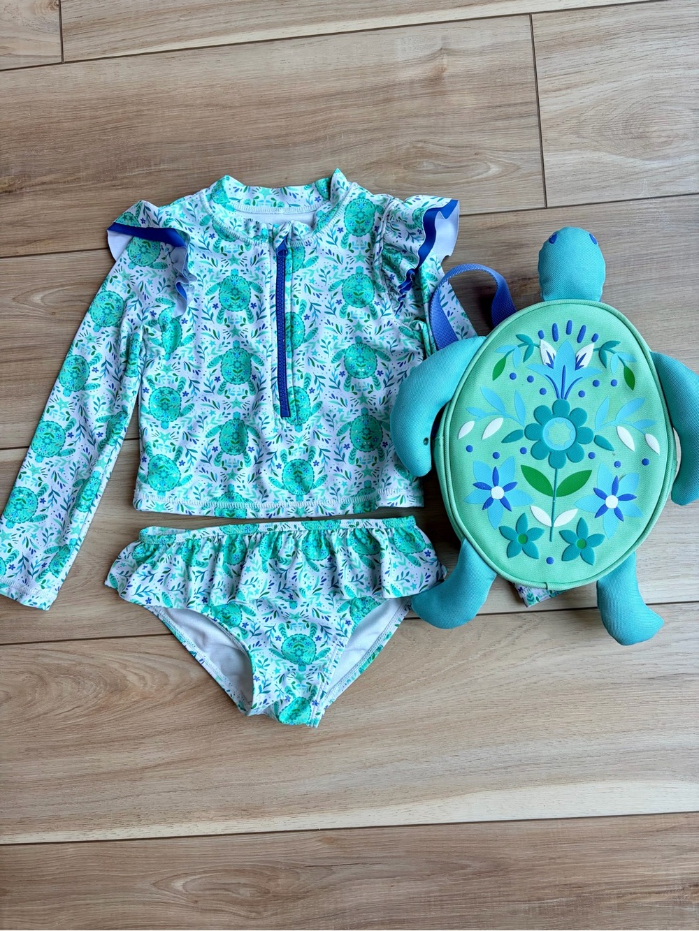 Girl’s bathing suit and matching turtle bag